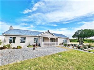 Established Coastal Home in a Sought-After Beach Area