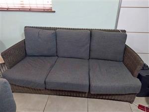 3 Seater inside or outdoor wicker couch. As new. Cushions have covers for inside or outside use