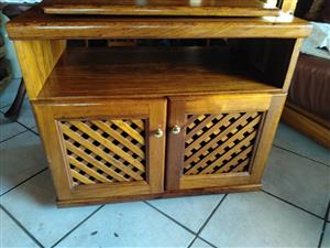 Solid wood TV cabinet with swivel top and wheels
