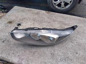 FORD FIESTA STI HEAD LIGHT L/SIDE for sale