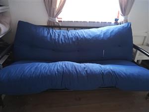 Sleeper couch with cushions
