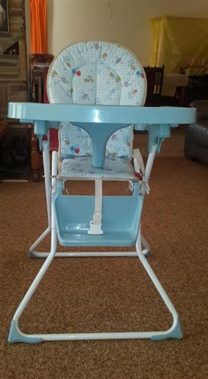 Blue feeding chair for sale