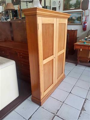 Vintage two door display case or bookcase featuring multiple interior shelves