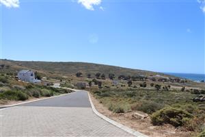 "Prime 405m2 vacant land with stunning ocean views, perfect for building your dream home.
