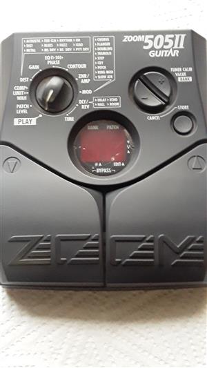 Zoom 505II Guitar Multi effects processor with operating manual.