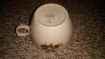 Pioneer Porcelain cups x 34