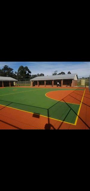 Tennis court, tar surfacing and  brick  paving