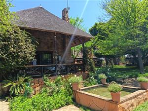 Lush 12ha Farm For Sale Near Buffelspoort – With River, Views & Rental Income