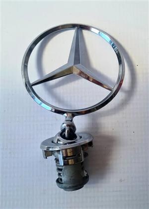 This is a genuine Mercedes-Benz hood star emblem, a shoppable automotive part.