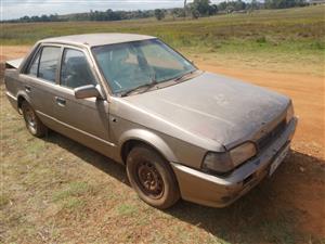 Mazda 323 sedan stripping 
