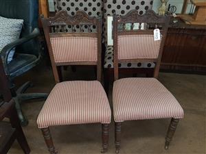 Pair of antique granny's chairs with front casters