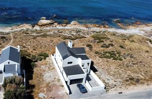 A Grand Slam Winner With Space, Style and Prime Uninterrupted Sea Views! It's called Location!!!