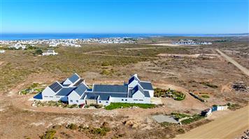 Exceptional Coastal Smallholding with Endless Potential and Panoramic Ocean Views