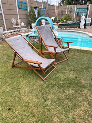 Pair of Vintage wooden adjustable deck chairs