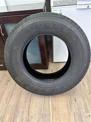Bridgestone jeep tyres 255 70R18 113t . 1 brand new & the other hardly used. Seapoint.