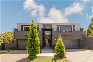 An Architectural Masterpiece of Light, Space & Refined Luxury