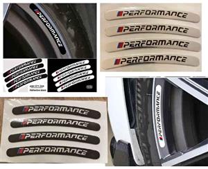 Performance aluminium embossed curved rim badges / stickers