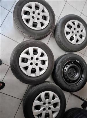 5 X 14 inches Hyundai standard rims with tyres & caps for sell 