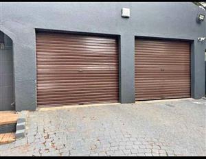 Rollup garage door motor