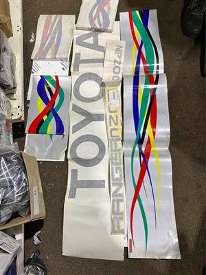 Quantam stickers and other cars call 