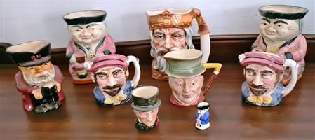 This collection features vintage Toby jugs and character jugs