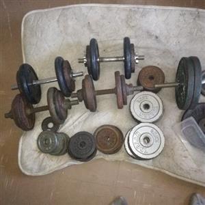 SEE PICS!! Pro Gym for 3 . See Pics Bench 2 or 3 straight Bars 3 Dumbells 2 easy bars 300kg+ weights