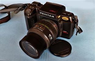 Asahi Pentax film camera beautiful condition with 4 lenses an x2 converter lens.