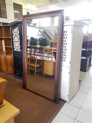 Vintage large  floor mirror with a rustic brown wooden frame