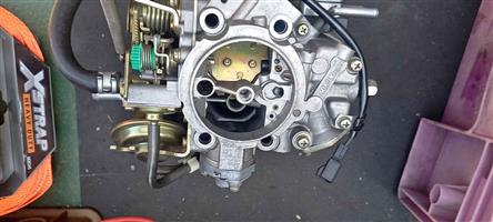 Mikuni double barrel down draft carburettor
