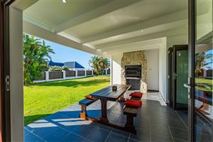 The open-plan lounge and dining area enjoys all-day