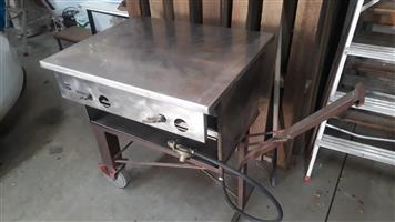 Stainless steel gas braai on wheels