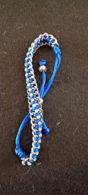 royal blue cord and small white rhinestones.