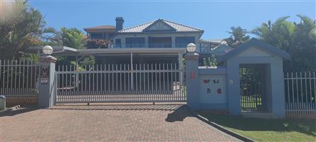 Entertainer's dream -  Modern 5 beachside beauty for sale in Manaba Beach, Margate.