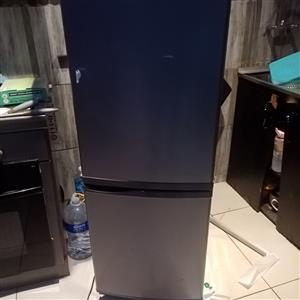Used defy fridge no shelves
