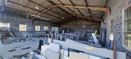 Industrial/Commercial Property with running business for sale in Newcastle Industrial Area.