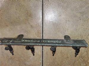 Mitsubishi outlander injectors with rail