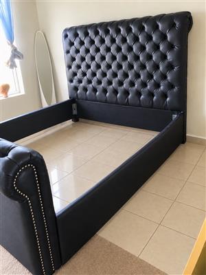 Queen-size upholstered sleigh bed