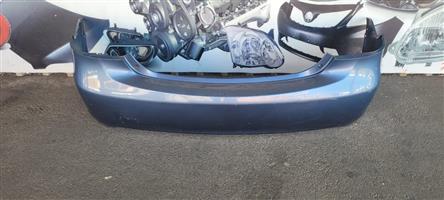 2010 TOYOTA YARIS SEDAN REAR BUMPER FOR SALE. IN PRISTINE CONDITION