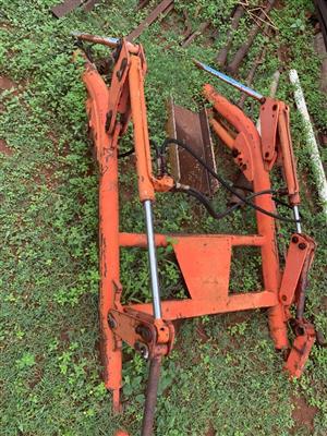 Front loader attachment for small tractor