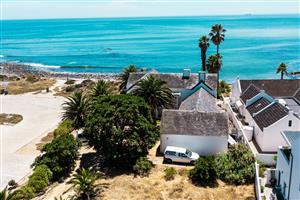 Front-Row Beachfront | Water’s Edge Luxury | A Rare Coastal Gem