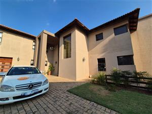 Elegant 4-bedroom home with 4 Bathrooms. Spacious Lounge, Modern Dining.