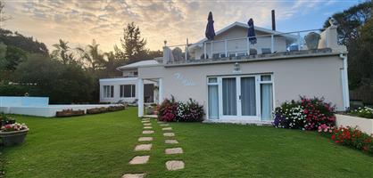 Versatile 6-Bedroom Guest House with Scenic Mountain Backdrop