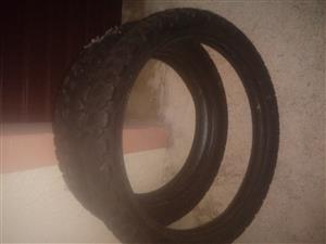 Two secondand tyres come off a KLR650 21 FRONT AND 18 BACK