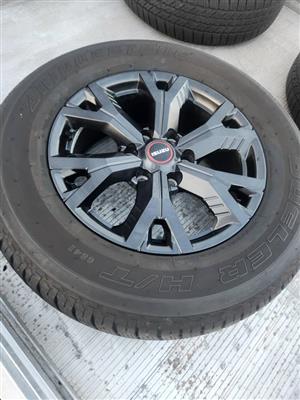 18" Isuzu V-Cross/X-Rider OEM mag with used 265/60/18 tyre to use for spare whee