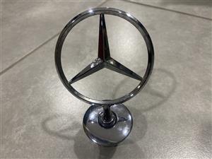 MERCEDES BENZ A123,W123,W201,C123,W124.C126 AND S126 STAR BADGE FOR SALE.