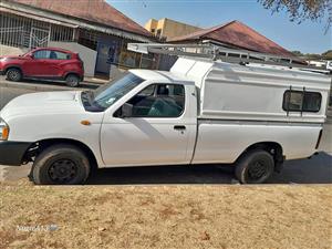 2010 NISSAN NP300 SINGLE CAB WIYH CANOPY AND CARRIER