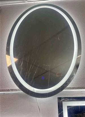 Oval round mirror with LED light. Frameless