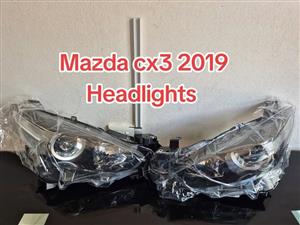 Headlights, taillights, or mirrors for your car. Brand-new