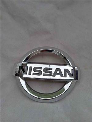NP200 GRILL BADGE.  BRAND NEW. FOR VARIOUS OTHER CARS TOO.
