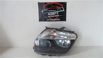 Renault Duster 2015 left headlight
